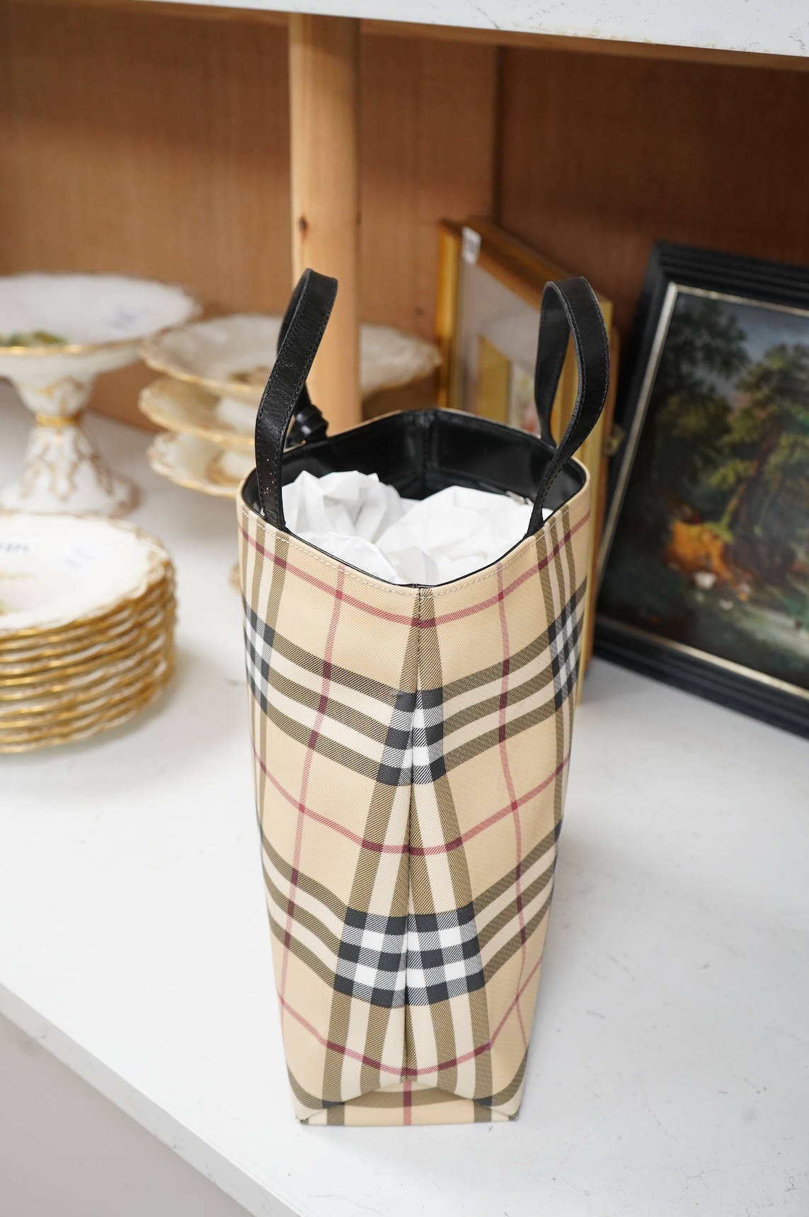 A Burberry handbag with PCV check exterior, 28cm wide
